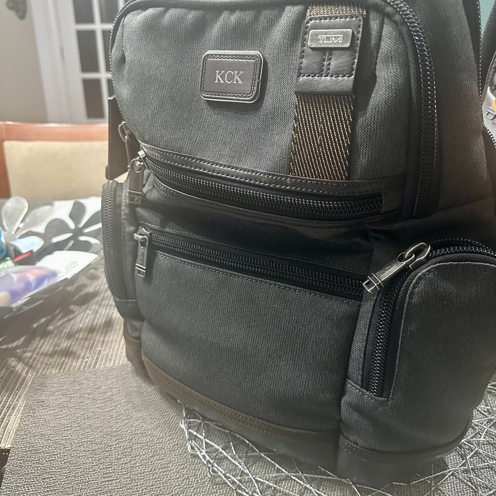 Tumi Grey & brown Backpack with Versatile Functionality